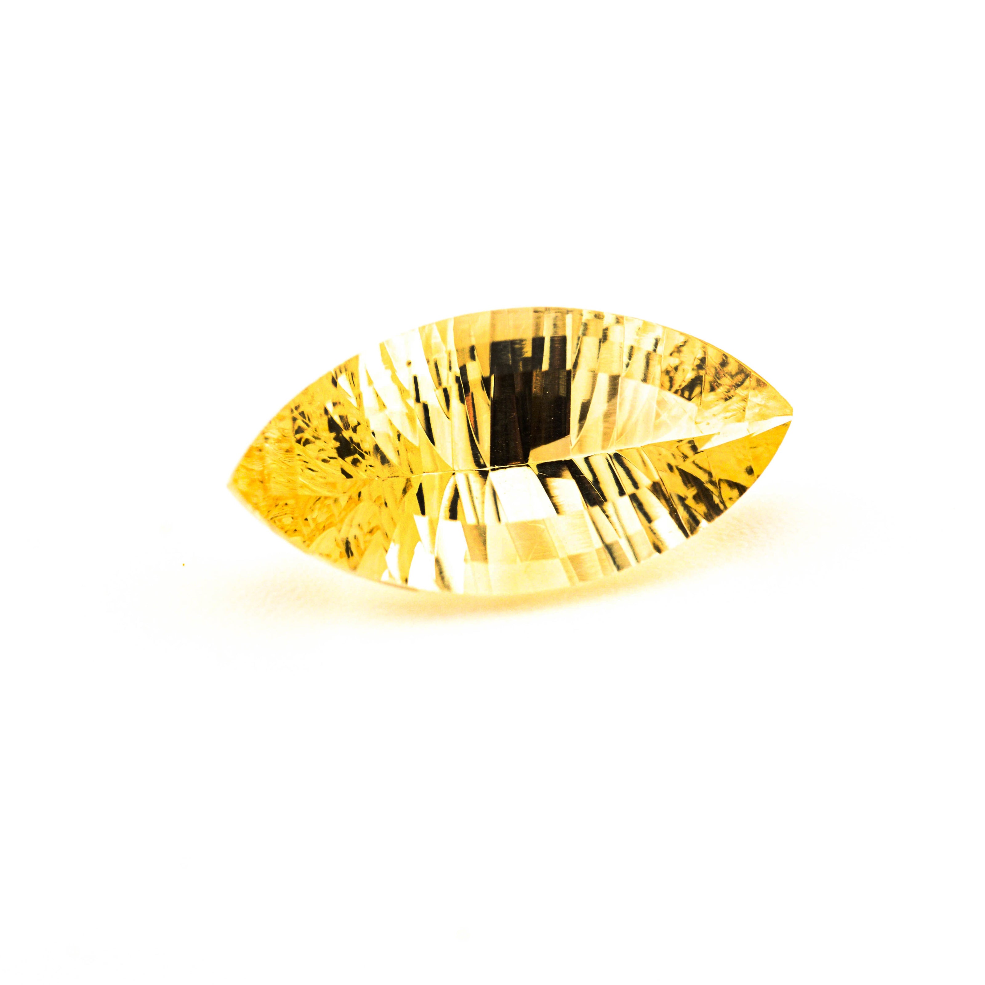 Gold gemstone on a white background