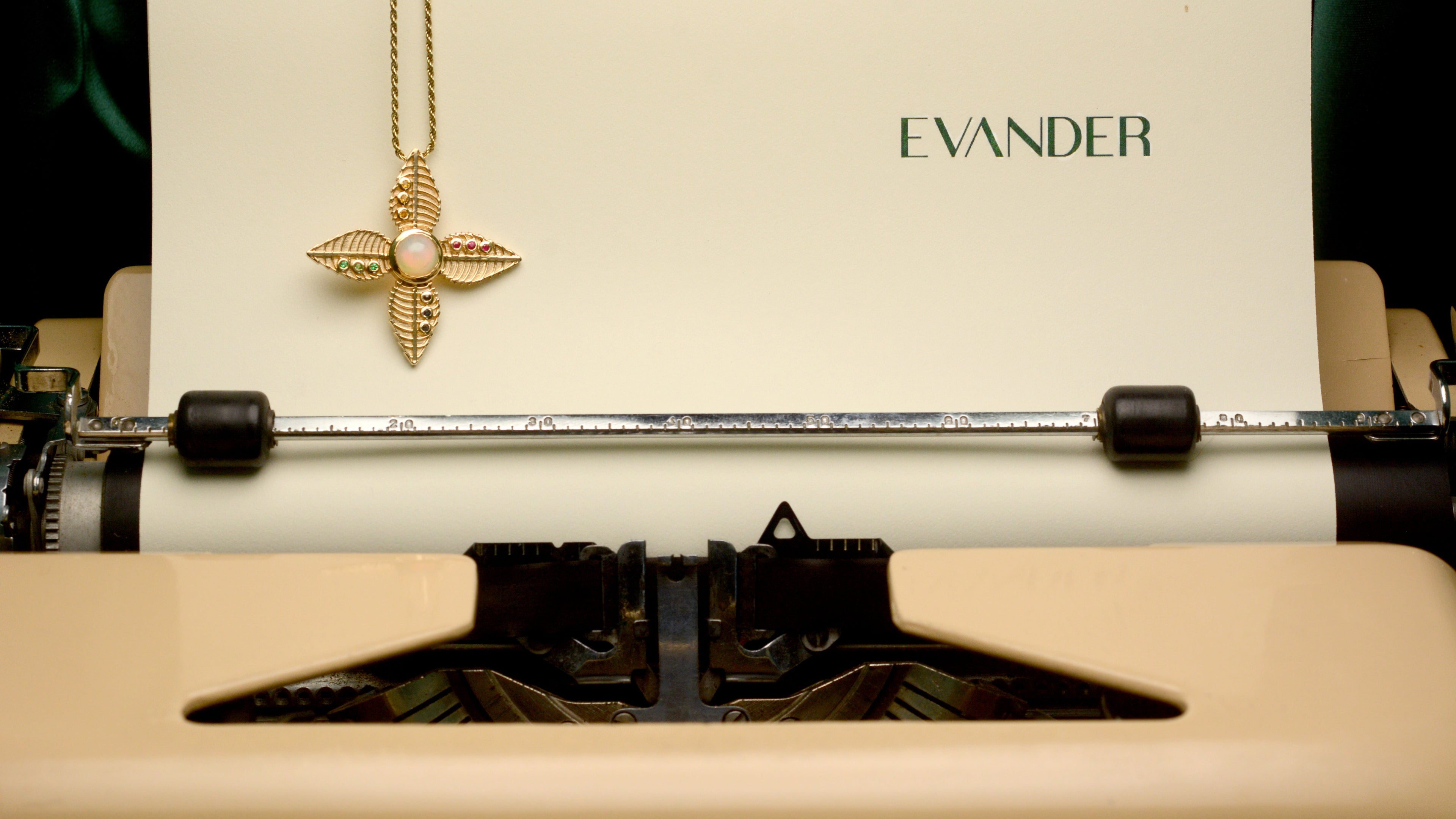Folia on a piece of paper labeled 'Evander' inside an old typewriter.