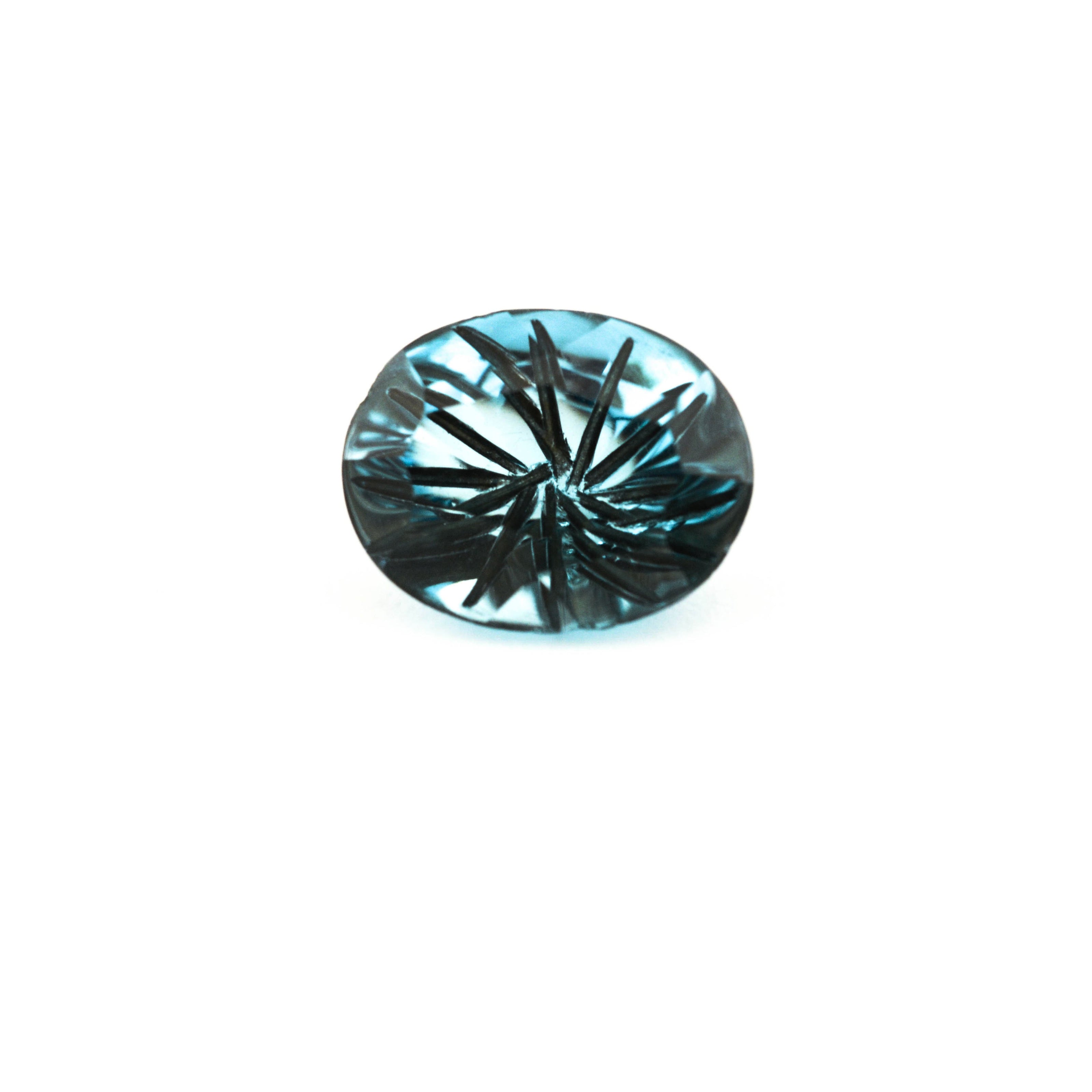 Blue gemstone on a white background